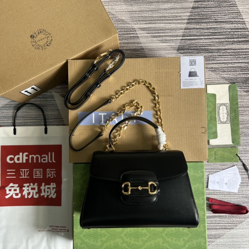 G*u*i top handle bags